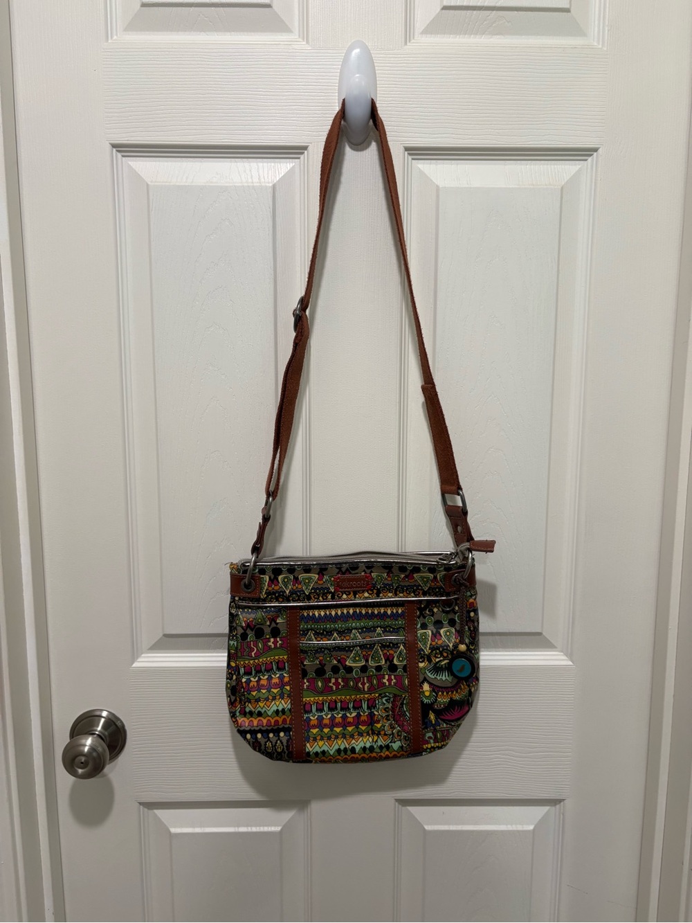 Sakroots Multicolor Artist Circle Print Crossbody with Brown Trim Coated Canvas